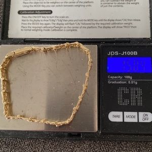 Almost 16 grams total weight and 7 mm width 8” to 9” long adjustable 10 kt gold